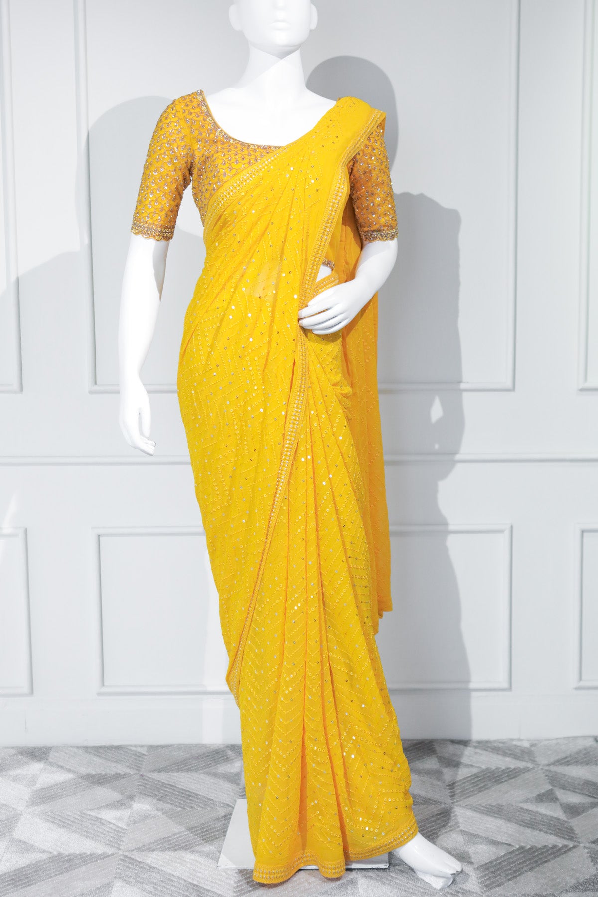 Yellow Georgette Saree with Handworked Net Blouse