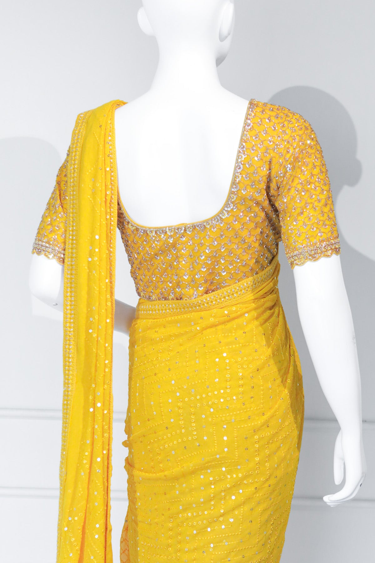 Yellow Georgette Saree with Handworked Net Blouse
